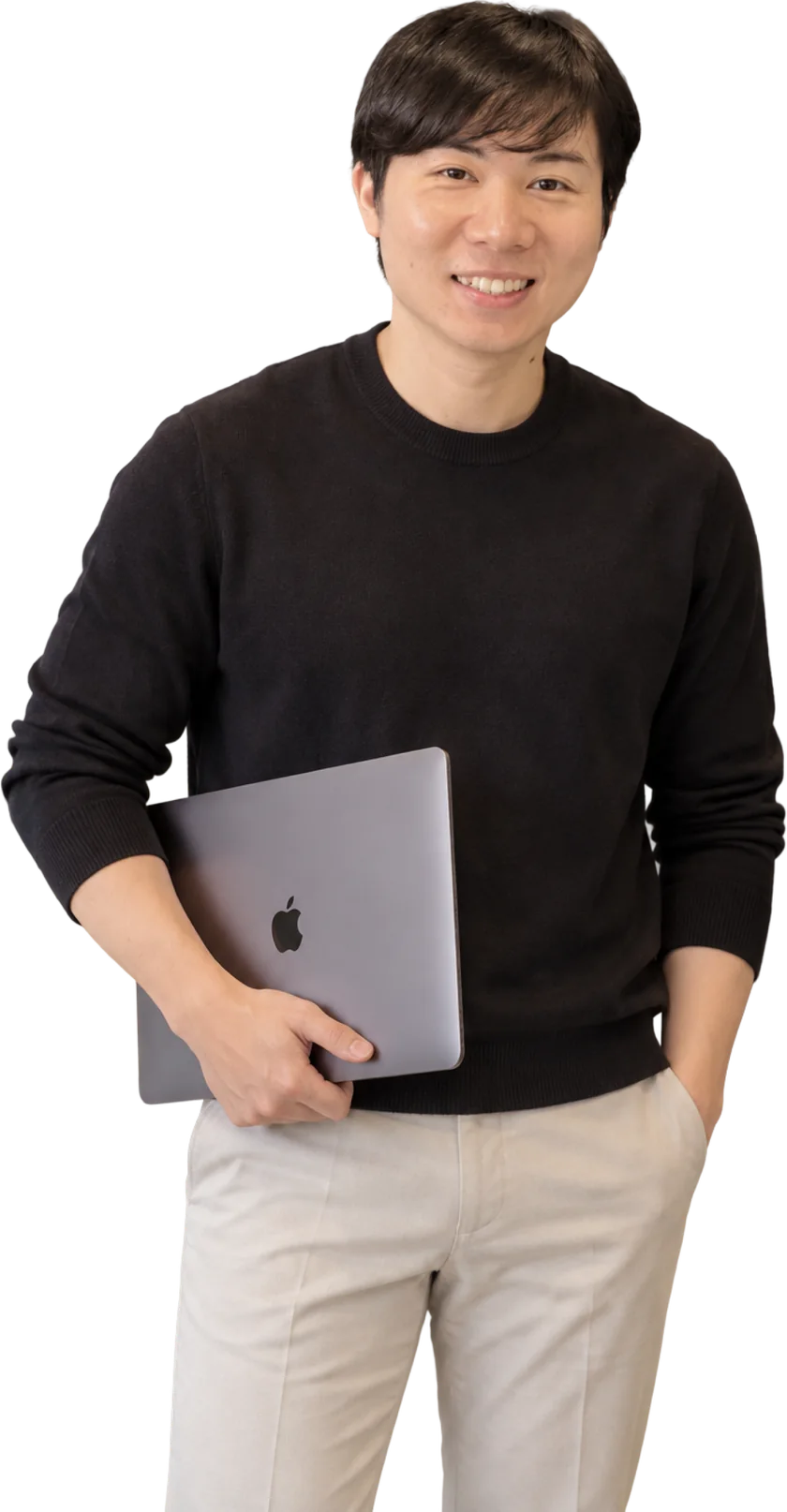Hoang Tran, CEO of Creatio Design, holding a laptop